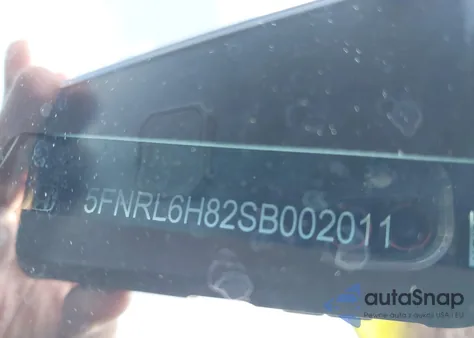 2025 Honda Odyssey Touring z USA, uszkodzony, nr VIN 5FNRL6H82SB002011